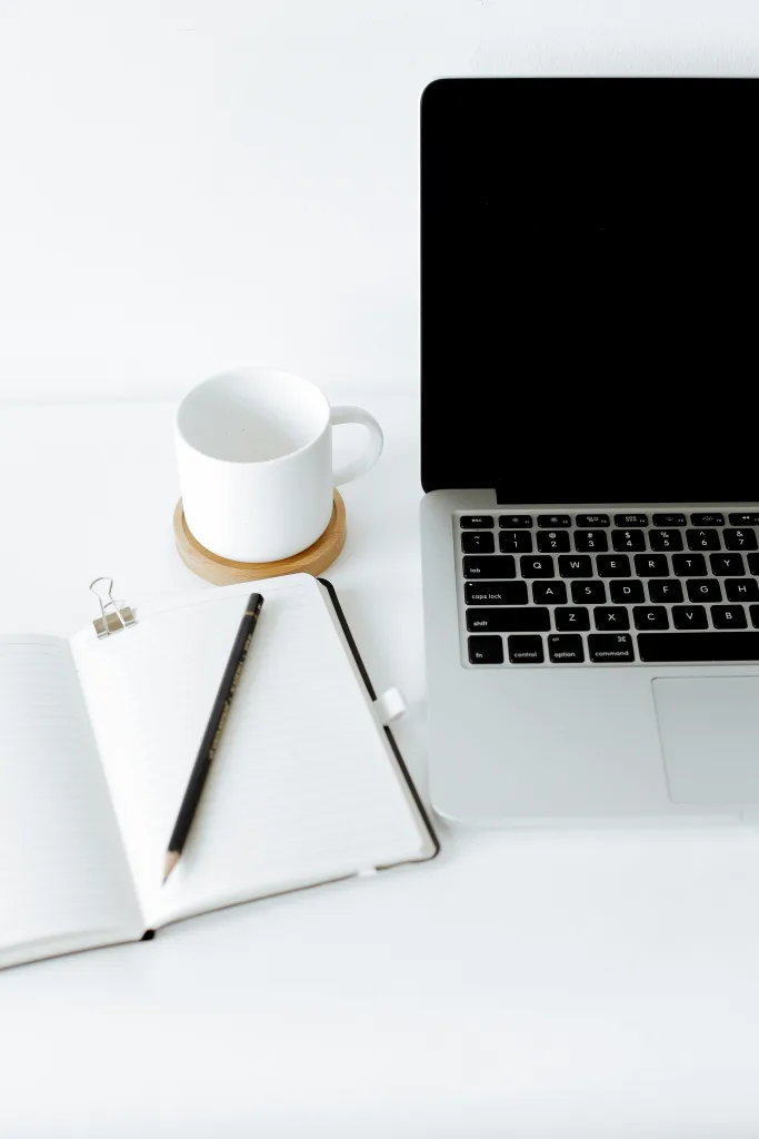 Laptop and notepad